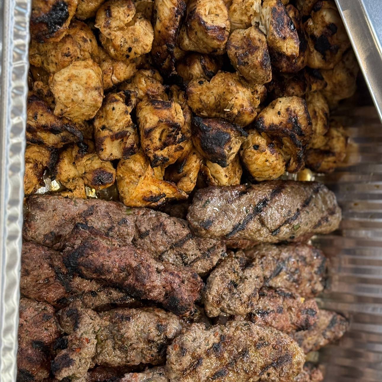 Large Mediterranean catering buffet with Halal kebab platters for corporate event in Mountain View